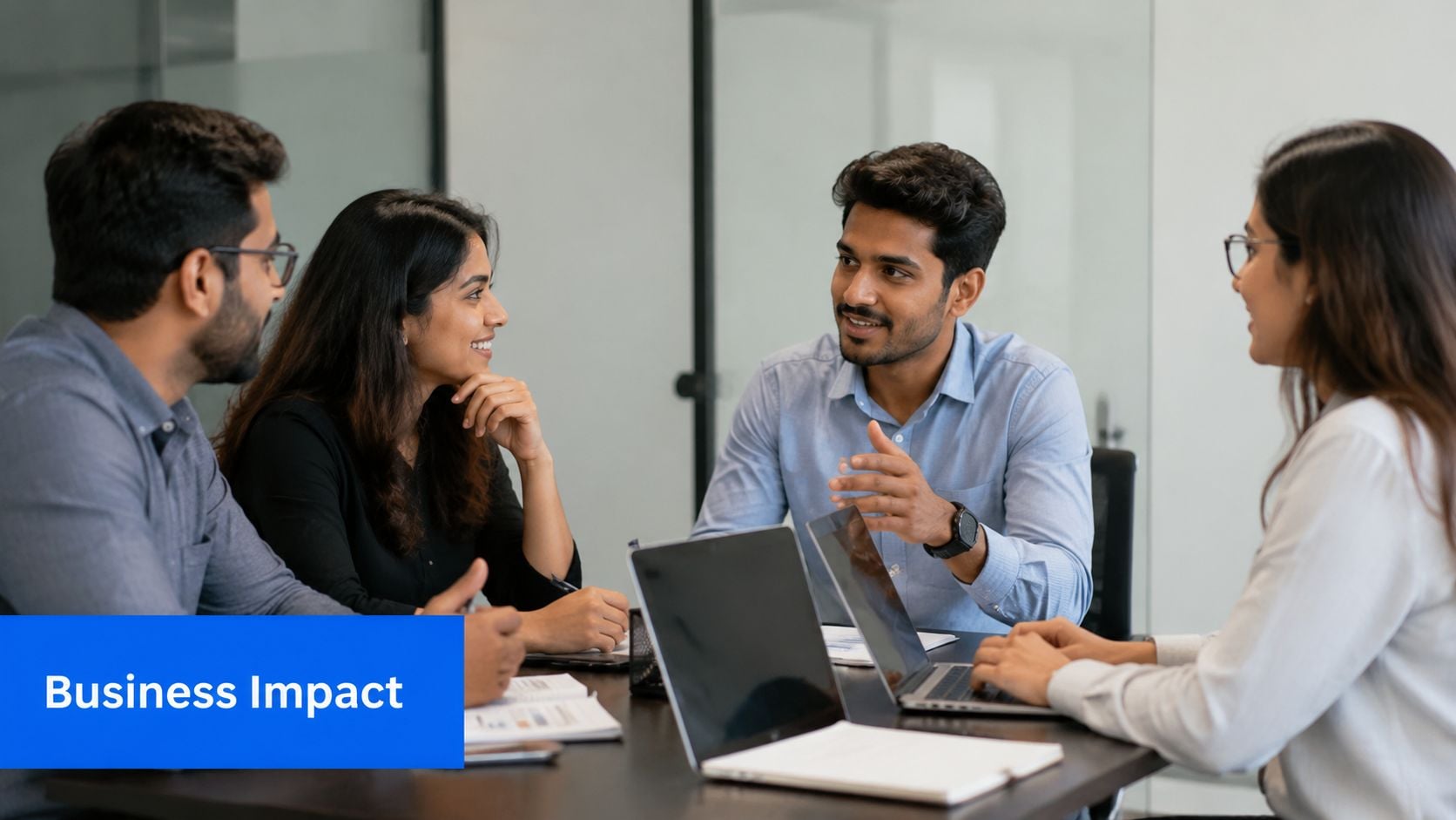 A professional business team having a productive meeting at a conference table in a modern office.